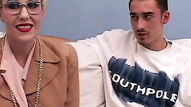 Blonde whore gets bent over and fucked from behind by a young hung stud