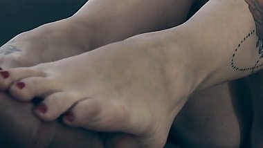 Hot Milf Gives Footjob