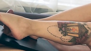 MILF with sexy legs gives FOOTJOB