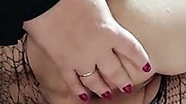 Spreading her ass for anal pounding