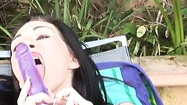 Horny babe fucks her huge pussy with a big purple dildo