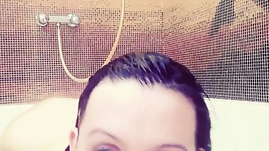 Girl with hairy pussy takes off her panties and bathes in a foam bath