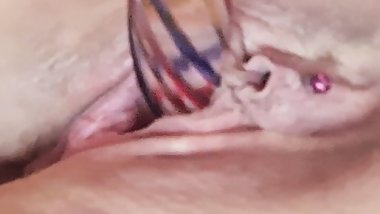 Debbie Ko playing with her juicy, pink, pierced pussy