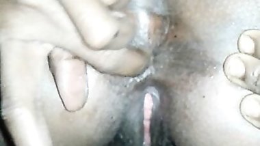 Mita fingers her ass