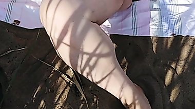 squirting from masturbation on a public beach 4