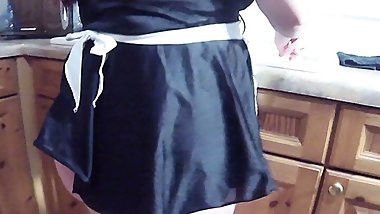 French Maid cleaning up in the kitchen sink