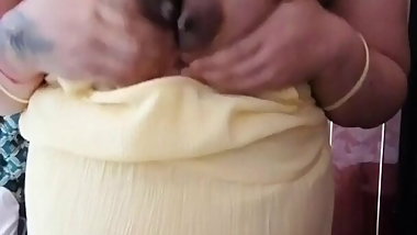 Pregnant wife milking her Asian boobs