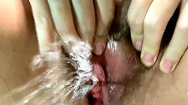 Squirting pussy orgasm close-up. Hot milf Stepmom squirts