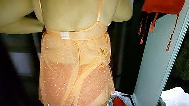 Mature beauty in a fitting room