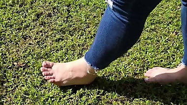 JuicyFeet walking on the grass