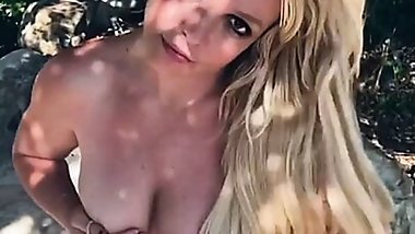 Britney Spears Strips &ndash; Covered Topless