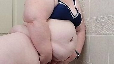 Redhead masturbates and licks cum off fingers.