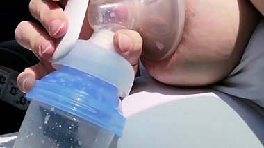 Pumping my big milk tits empty in the car