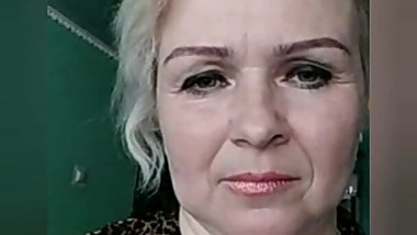 Russian woman undresses in front of the camera and masturbates