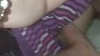 Pussy lips spread with my tongue buried between her lips