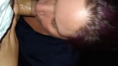 Purple haired BBW milf sucks cock outdoors