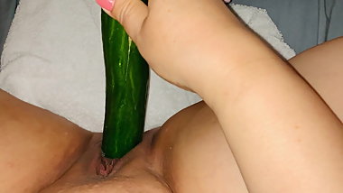 Being naughty with a cucumber