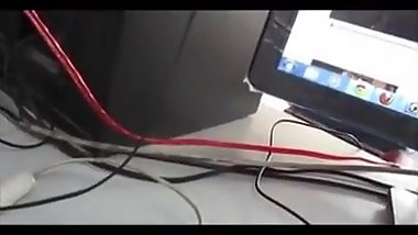 Desi Auntie sucks cock while guy works.