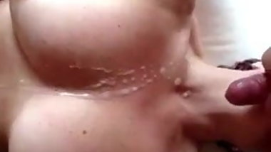Wife takes load while using dildo