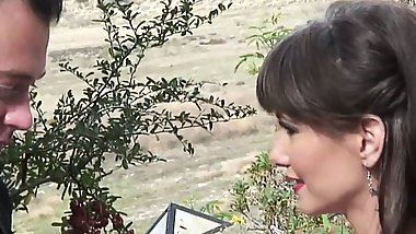 Brown haired Milf with silicone tits gets a boob cumshot